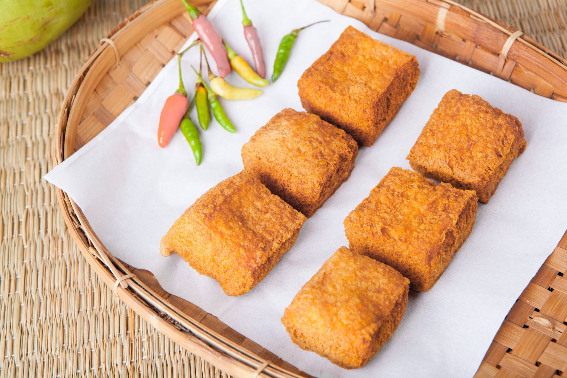 fried tofu on bamboo tray